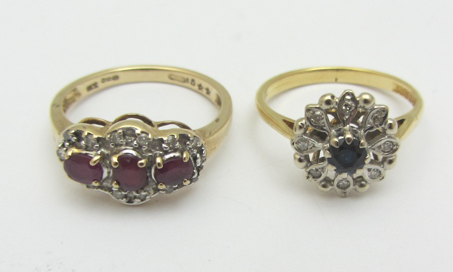 Appraisal: A ct gold ring mounted with a row of three