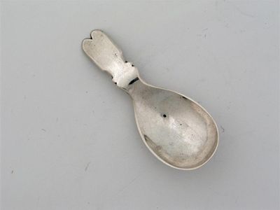 Appraisal: A George III plain caddy spoon with a shaped stem