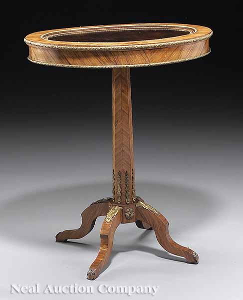 Appraisal: A Directoire-Style Bronze-Mounted Kingwood Side Table oval top inset with