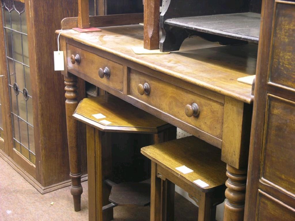 Appraisal: A Victorian mahogany writing table low raised back above two