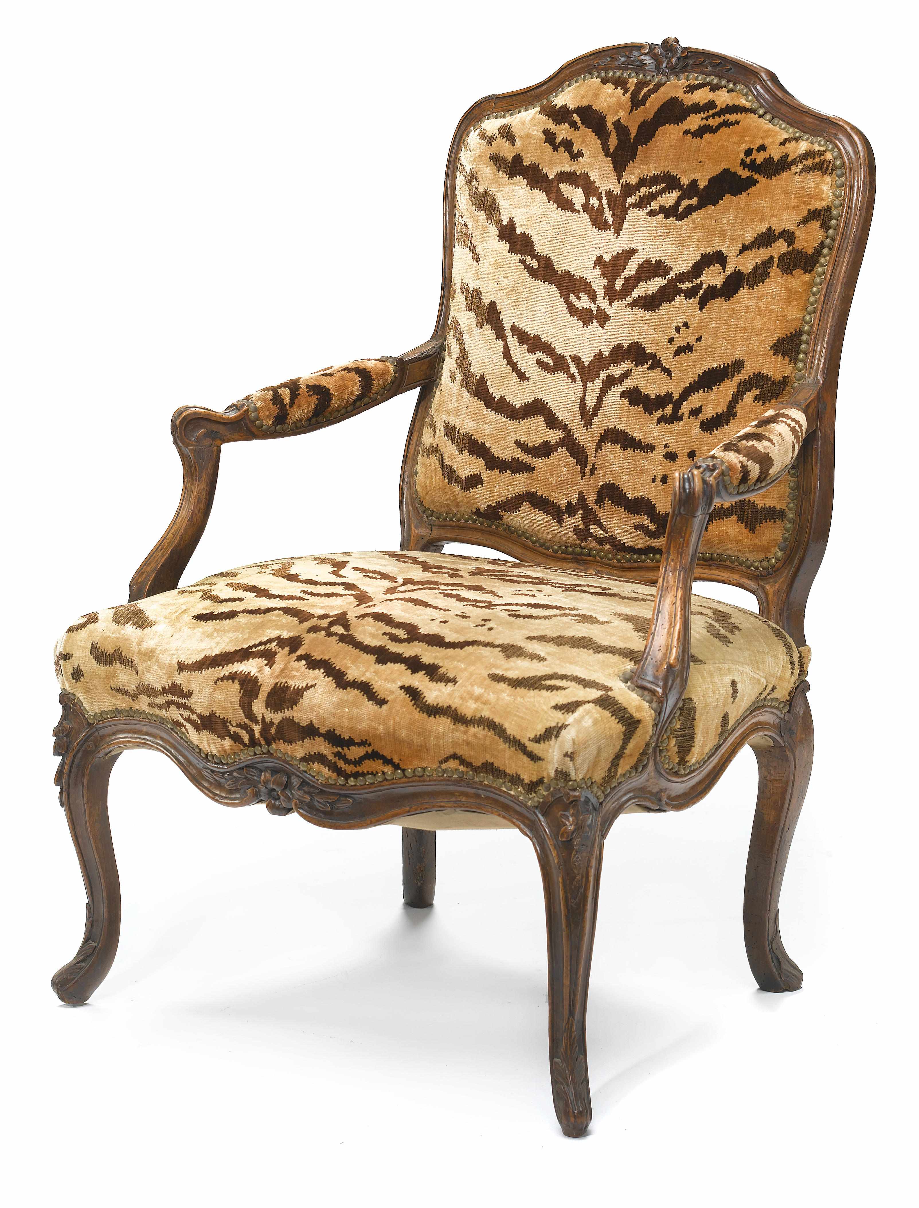 Appraisal: A Louis XV walnut fauteuil third quarter th century The