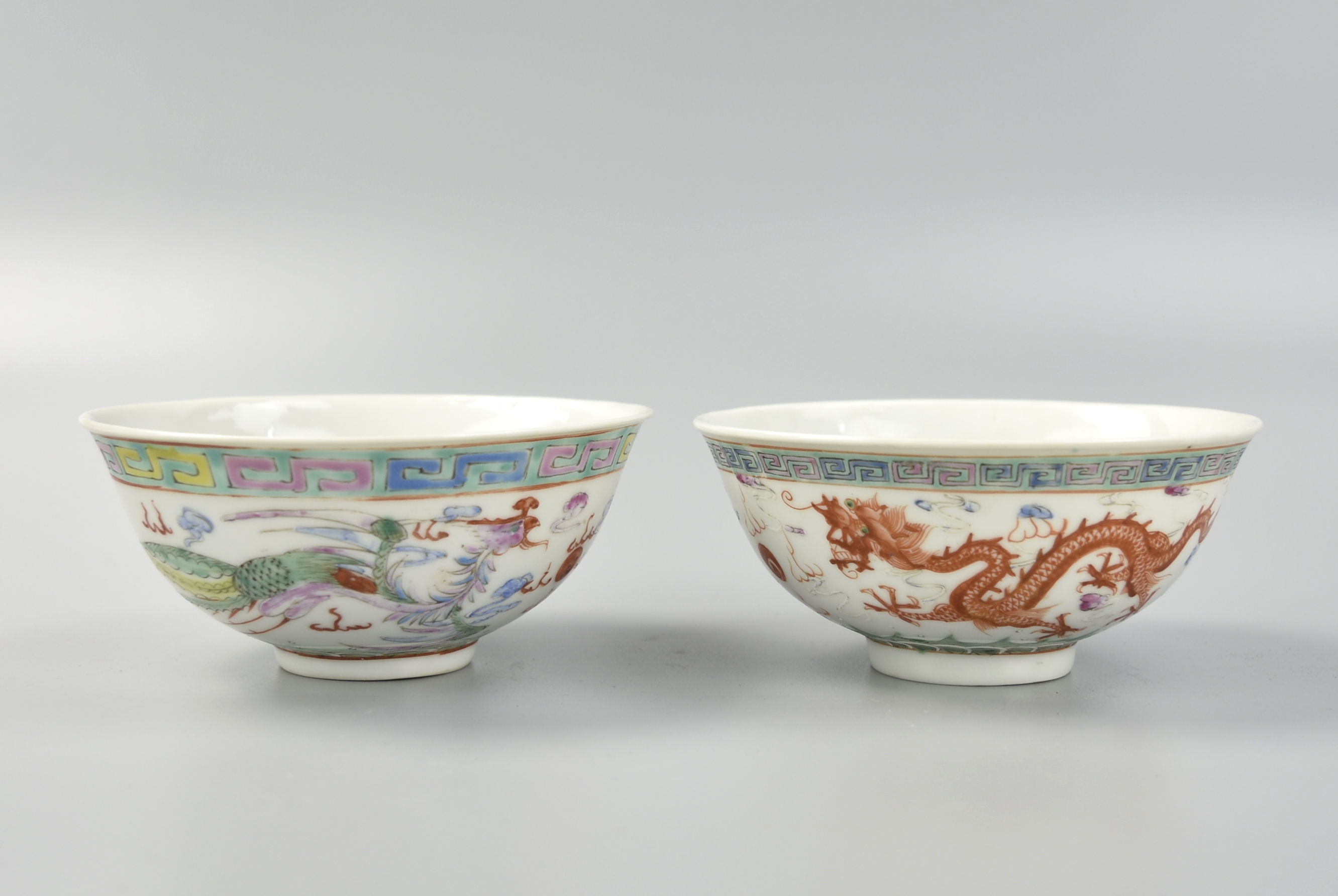 Appraisal: PAIR OF CHINESE FAMILLE ROSE DRAGON BOWL TH C Chinese