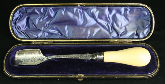 Appraisal: A fine Victorian Stilton cheese scoop in sterling silver with