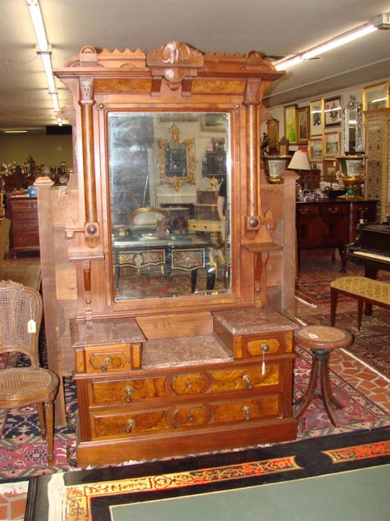 Appraisal: Eastlake Victorian carved walnut drop-center dresser circa heavy cornice centered