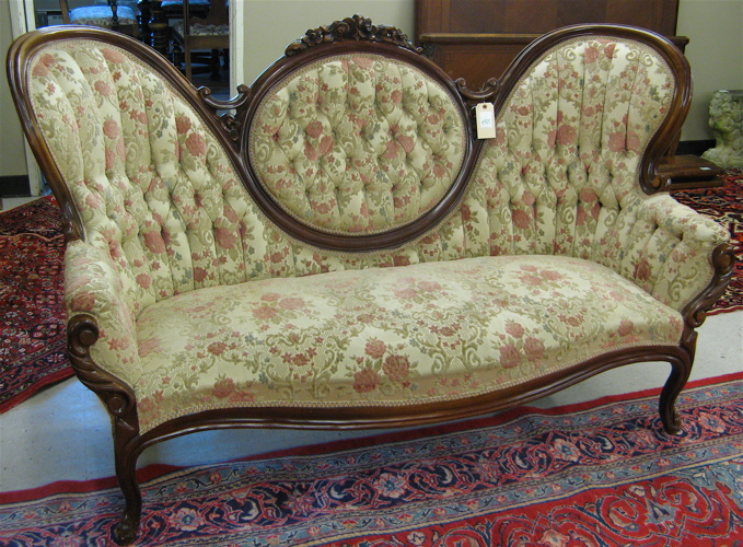 Appraisal: VICTORIAN STYLE MEDALLION-BACK SOFA American th century having a molded