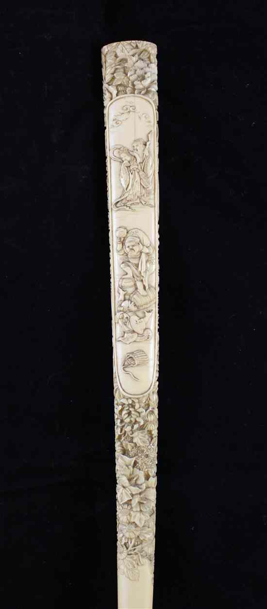 Appraisal: A Japanese ivory handled umbrella Meiji period - the tapering