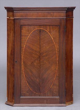 Appraisal: GEORGE III INLAID MAHOGANY CORNER CABINET The dentil-applied cornice with