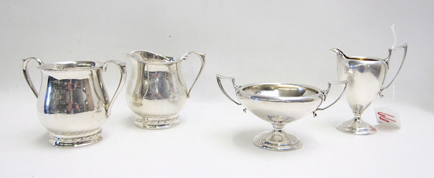 Appraisal: STERLING SILVER HOLLOWWARE four pieces comprised of two cream pitcher