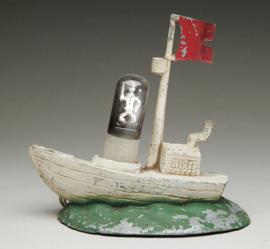 Appraisal: POPEYE LIGHT WITH BOAT Diecast boat enameled in white and