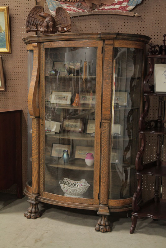 Appraisal: CHINA CABINET Oak having curved glass door and sides scrolled