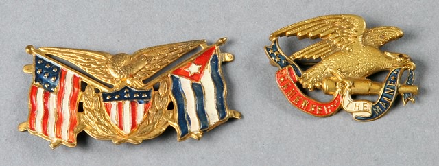 Appraisal: brass Spanish- American pins is the eagle cannon and Remember