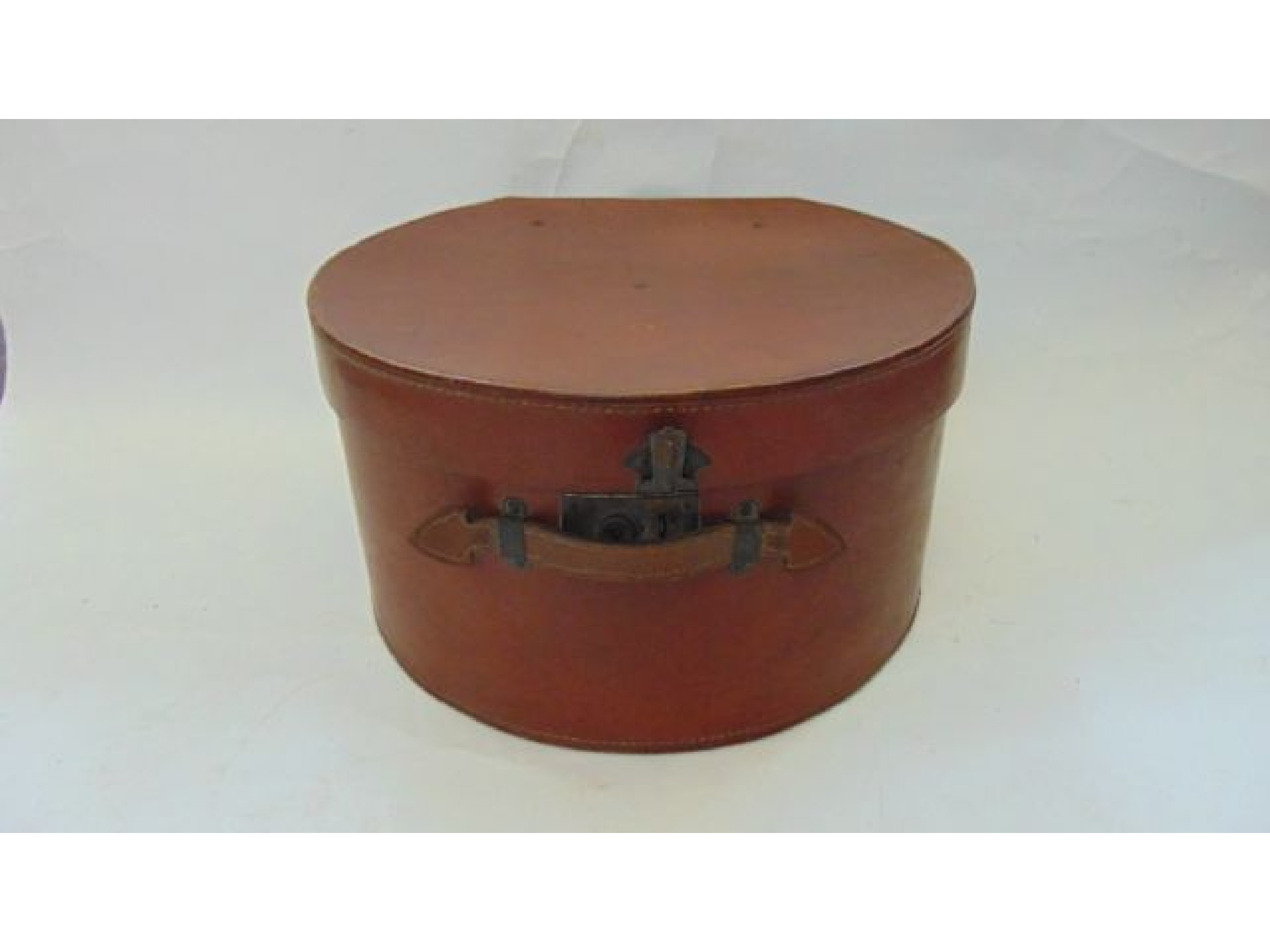 Appraisal: A large th century stitched brown leather hat box of