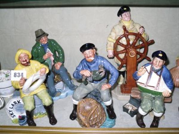 Appraisal: Five Royal Doulton figures The Boatman HN The Lobster man