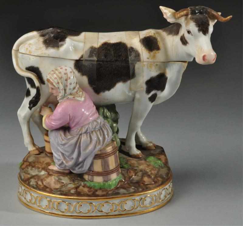 Appraisal: Meissen Crossed Swords Girl Milking Cow Tray Description With lid