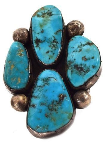 Appraisal: Large Native American silver content unknown and turquoise ring three