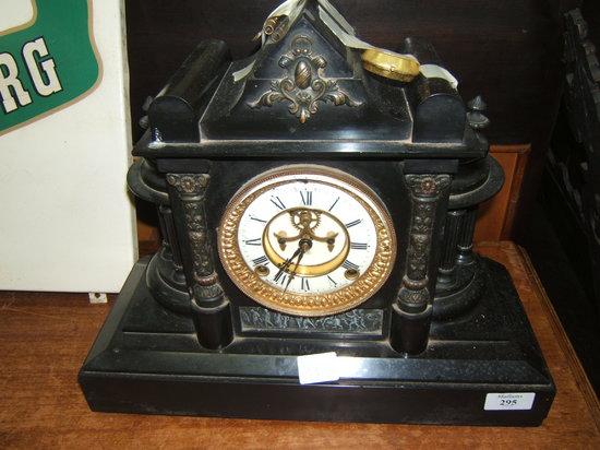 Appraisal: An American black slate mantel clock the two part dial