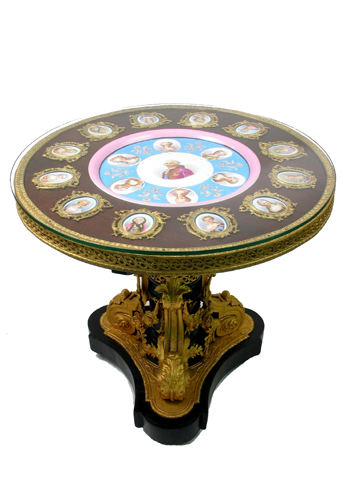 Appraisal: NAPOLEON III ORMOLU AND SEVRES PORCELAIN-MOUNTED EBONIZED CENTER TABLE French