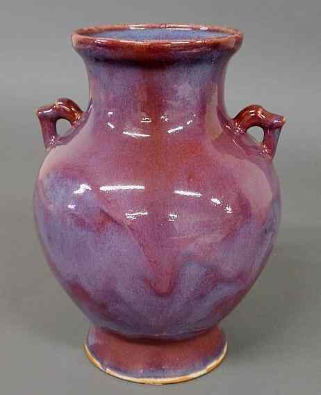 Appraisal: Flamb porcelain vase th c with applied handles h