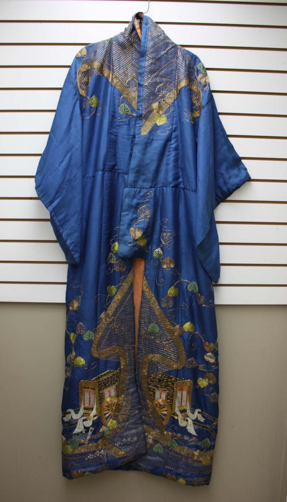 Appraisal: JAPANESE EMBROIDERED SILK ROBE a long blue silk robe with