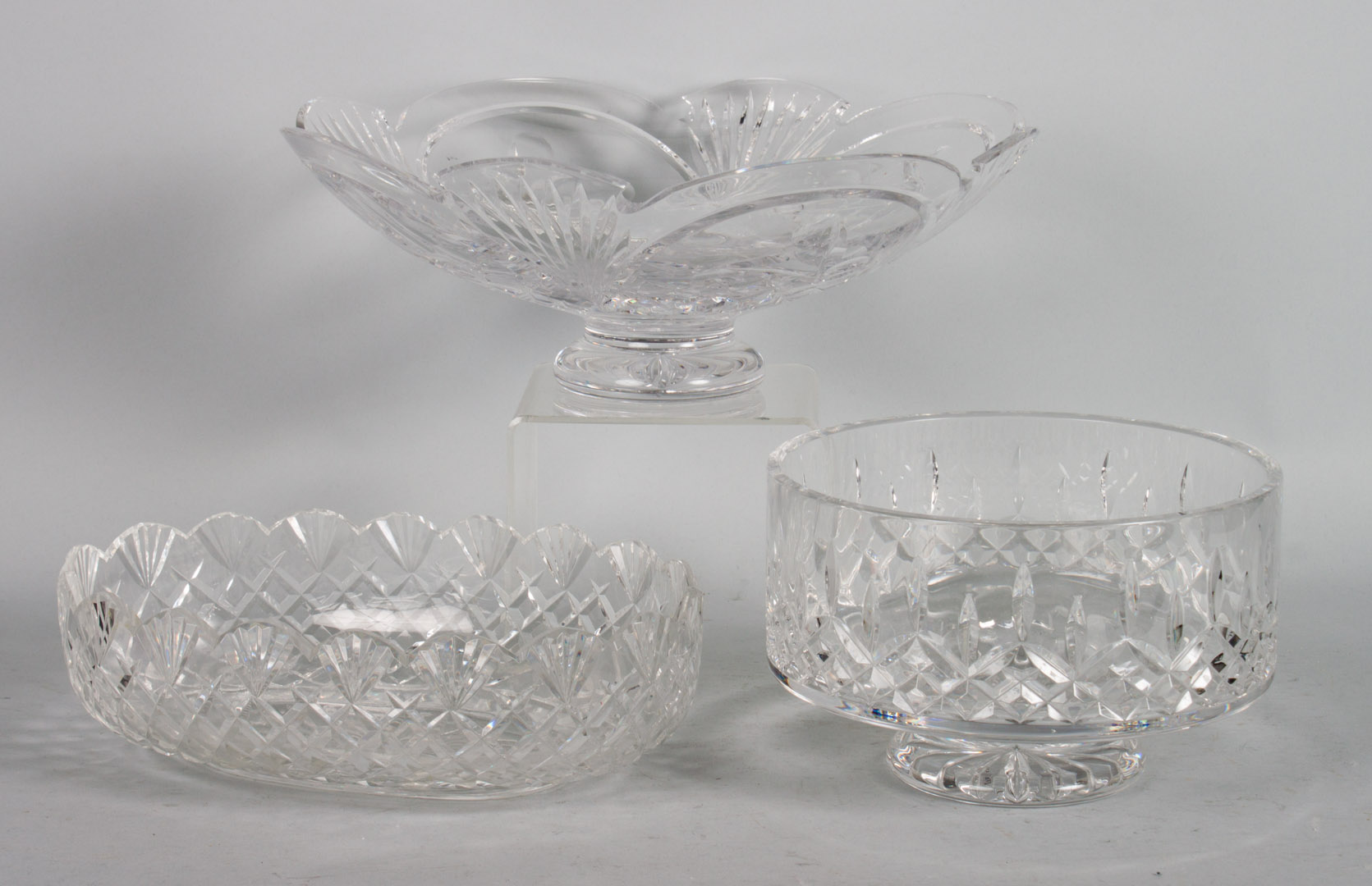 Appraisal: Three Waterford centerpieces footed centerbowl scalloped edge centerbowl and scalloped