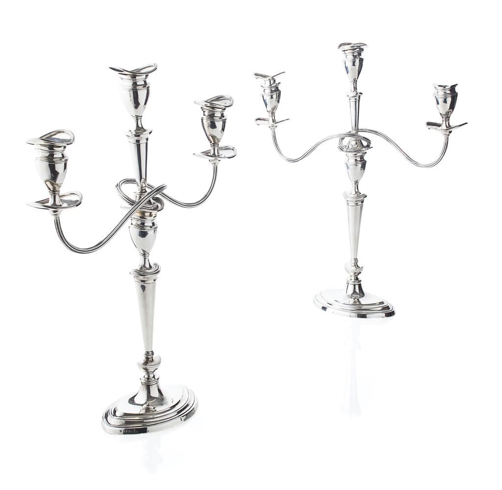 Appraisal: A pair of three light table candelabra TB S London