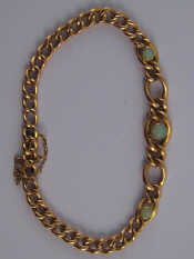 Appraisal: A yellow metal tests carat gold opal bracelet marked ct