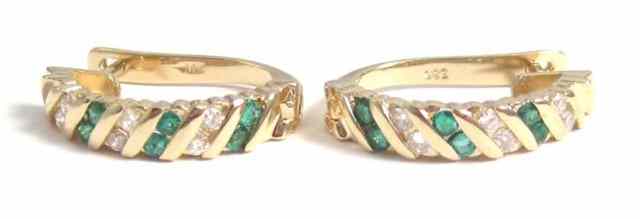 Appraisal: PAIR OF EMERALD AND DIAMOND EARRINGS each k yellow gold