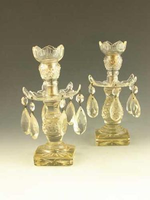 Appraisal: A near pair of Victorian cut glass table lustres hung