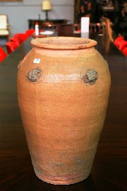 Appraisal: Two earthenware oil amphoras