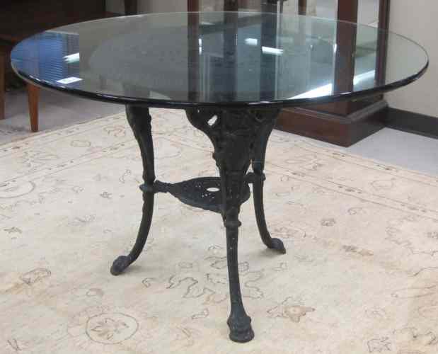 Appraisal: GLASS-TOP WROUGHT IRON DINETTE TABLE English c the black cast