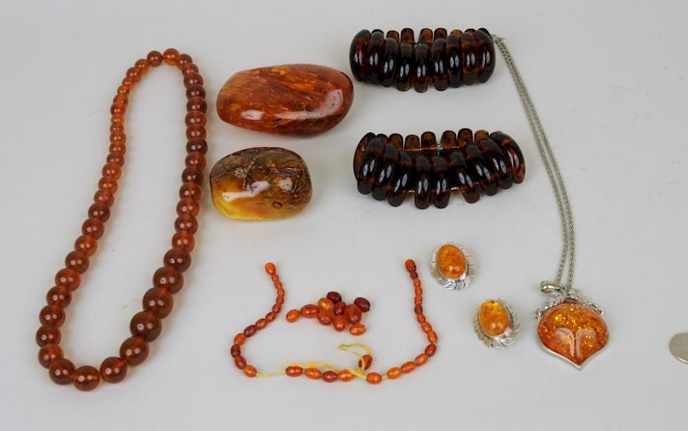 Appraisal: Group Amber Jewelry Group of amber jewelry comprising two nuggets