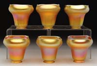 Appraisal: SIX STEUBEN GOLD AURENE SHADES Iridescent gold color with purple