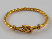 Appraisal: A Russian hallmarked standard gold approx carat bangle also with