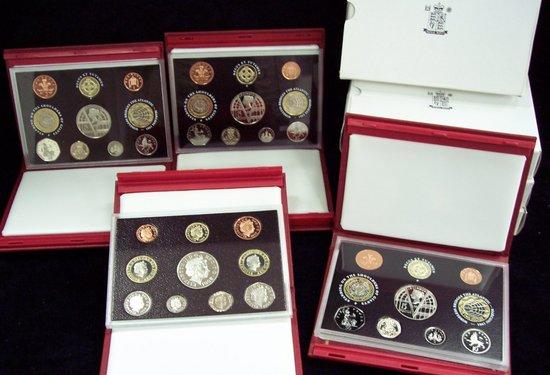 Appraisal: Four United Kingdom deluxe proof sets of coinage 'Glimpses of