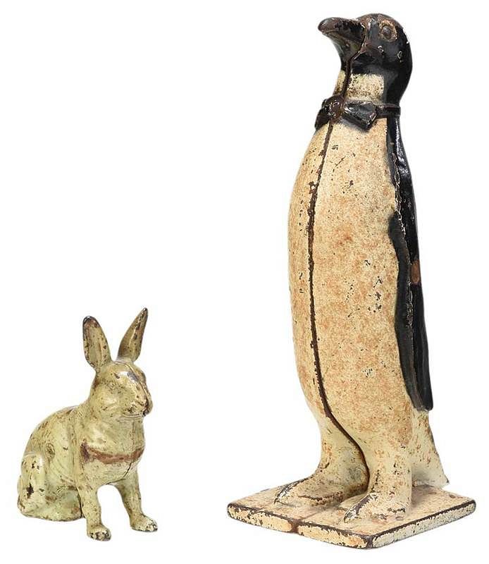 Appraisal: Cast Iron Penguin Doorstop and Rabbit Bank American early th