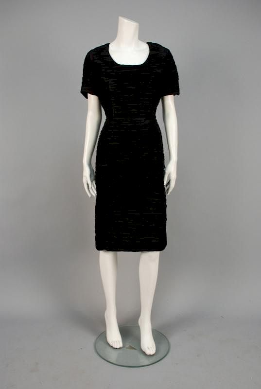 Appraisal: SYBIL CONNOLLY DUBLIN TWO-PIECE DRESS and SKIRT s Horizontally hand