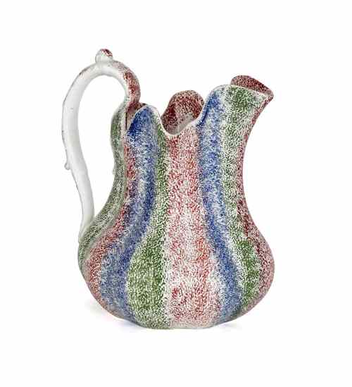 Appraisal: Red blue and green rainbow spatter pitcher th c h