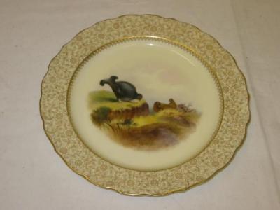 Appraisal: A ROYAL WORCESTER PORCELAIN PLATE painted with Grouse by Johnson