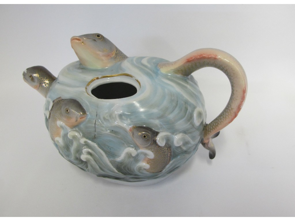 Appraisal: Meissen porcelain teapot modelled in relief with fish swimming in