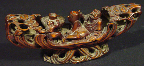 Appraisal: Chinese boat shaped hardwood carving on stand cm in length