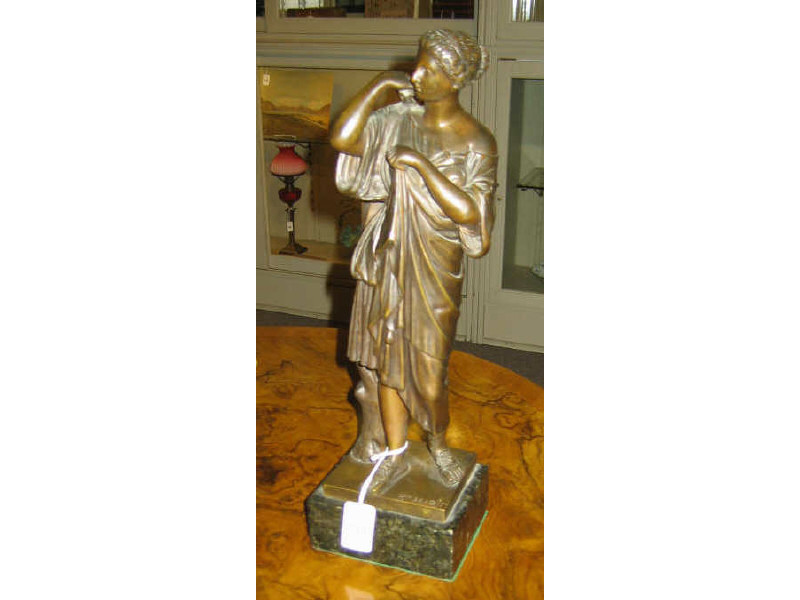 Appraisal: CAST BRONZE FIGURE OF CLASSICAL WOMAN Standing wearing a toga