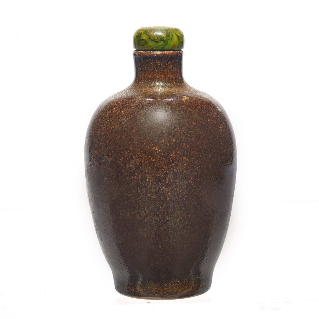 Appraisal: CHINESE TEA-DUST-GLAZED SNUFF BOTTLE Chinese tea-dust-glazed snuff bottle with a