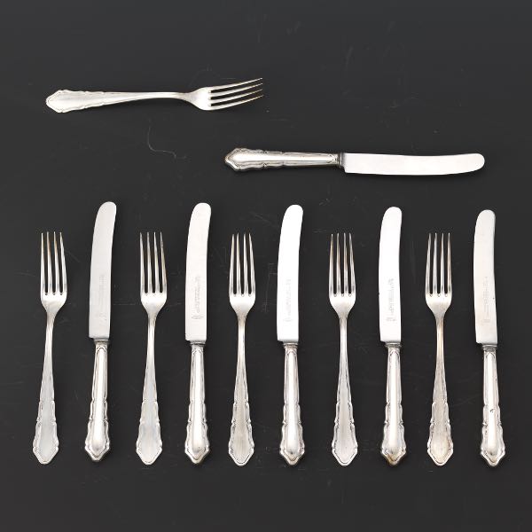 Appraisal: TWELVE GERMAN SILVER FRUIT KNIVES AND ELEVEN FRUIT FORKS BY