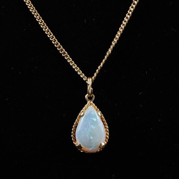 Appraisal: Yellow gold k Animoca Jelly Opal drop pendant on chain