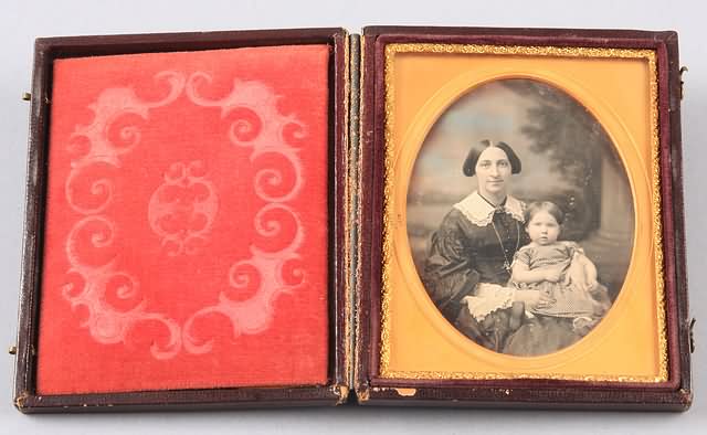 Appraisal: Quarter plate daguerreotype of woman with girl on her lap