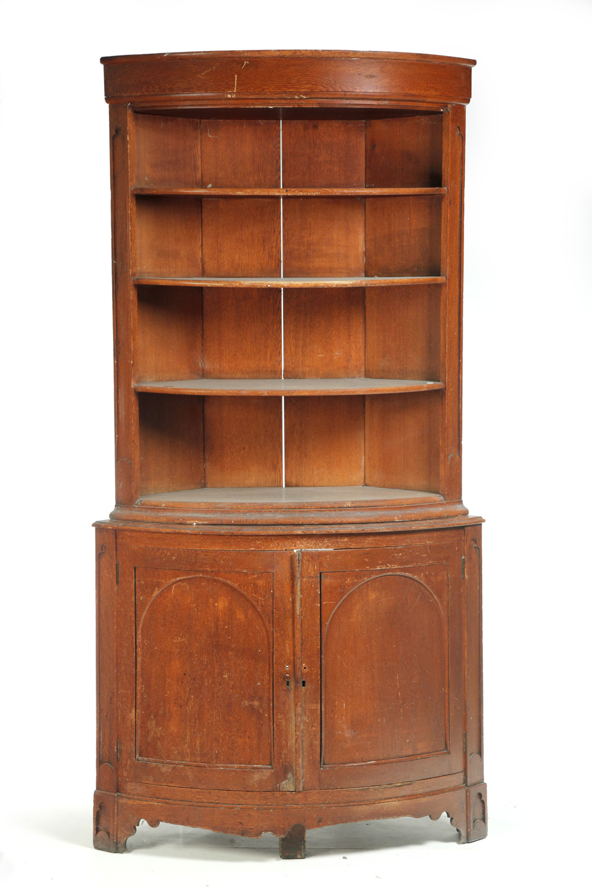 Appraisal: TWO-PIECE BOW FRONT CORNER CUPBOARD England nd half- th century