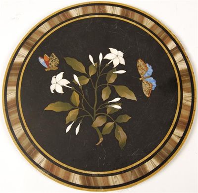 Appraisal: A Victorian pietra dura circular plaque decorated with lilies and