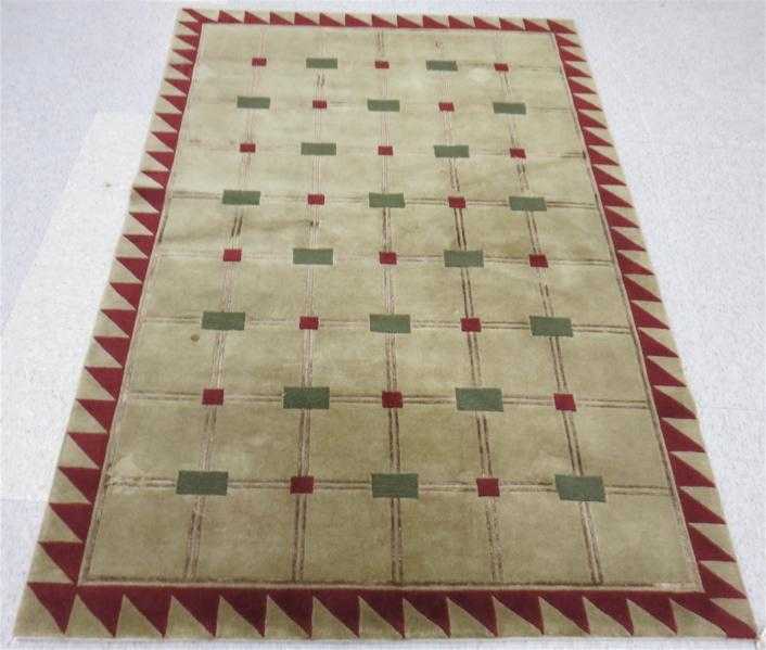 Appraisal: A CONTEMPORARY ORIENTAL AREA RUG Nepal hand knotted repeating plain