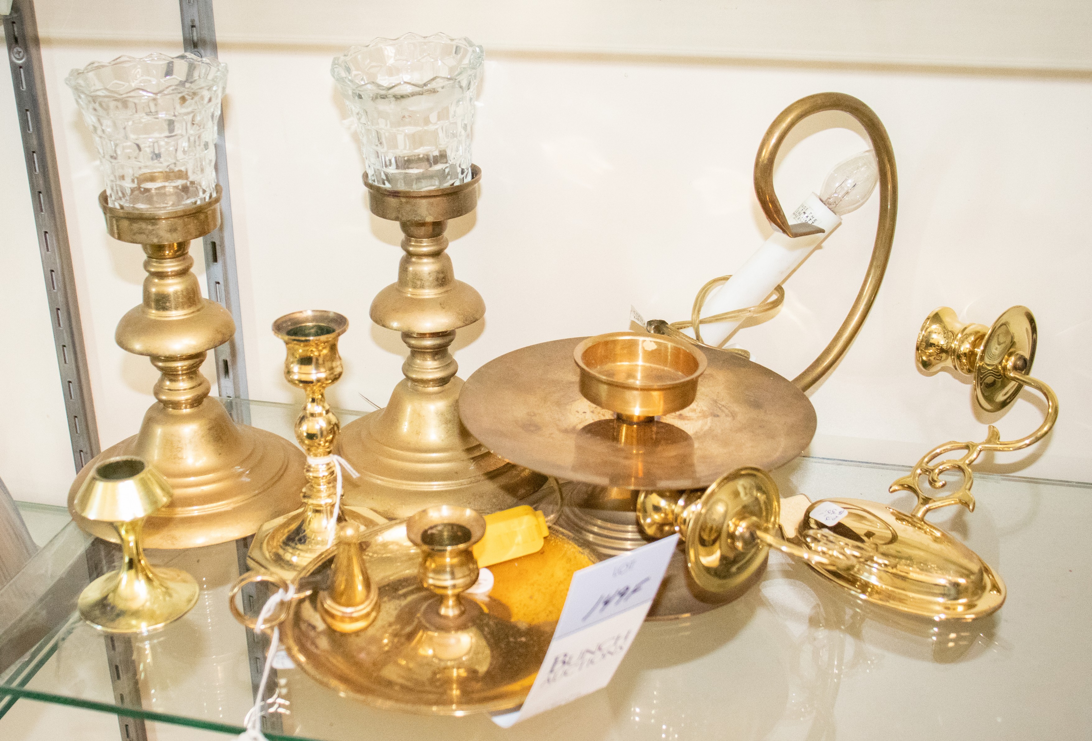 Appraisal: Brass candlesticks c o pair with glass votive inserts h