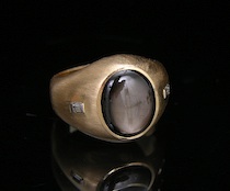 Appraisal: A Black Star Sapphire Ring k brushed yellow gold ring